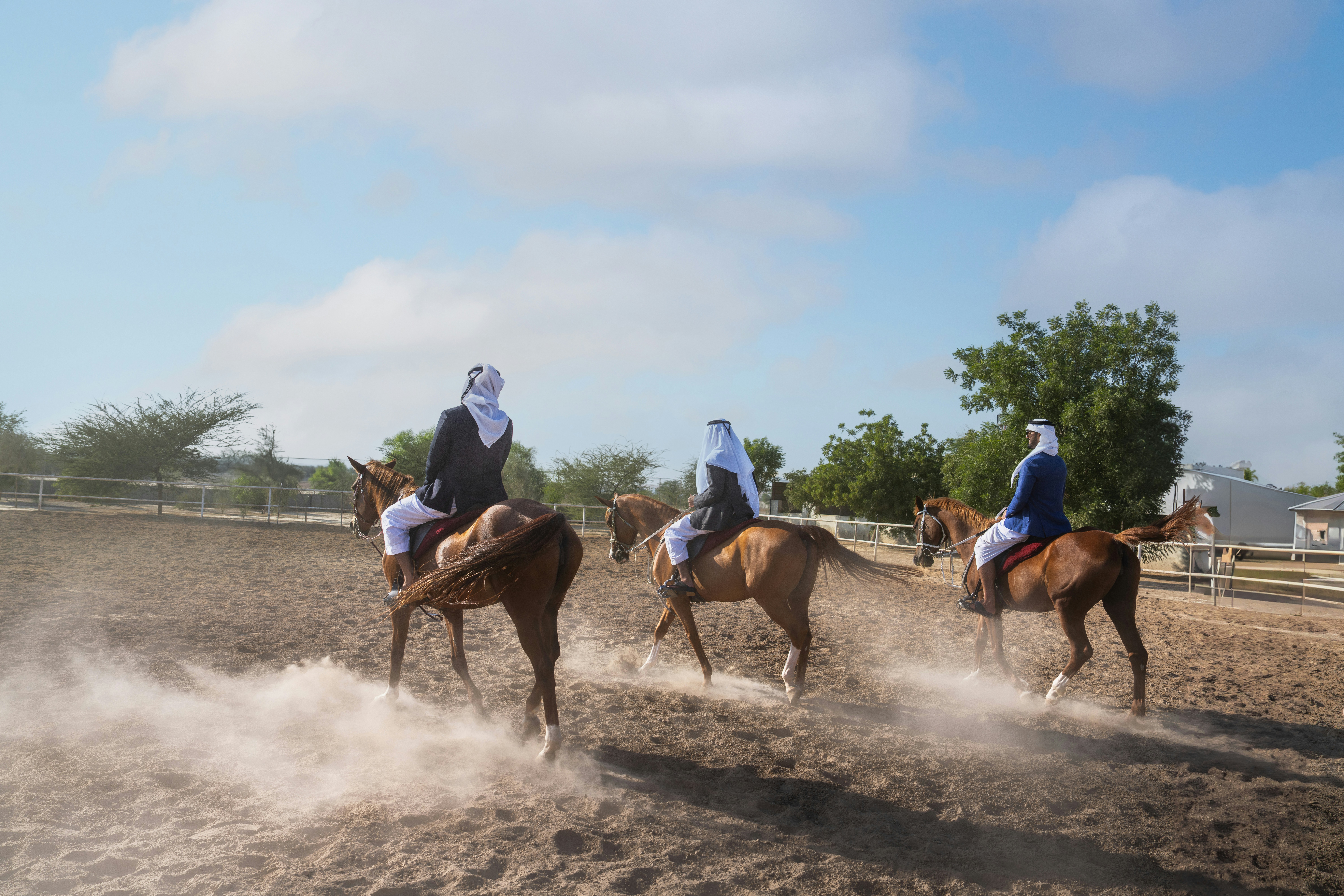 Arab riders on horses in dust — fed by Arizona water